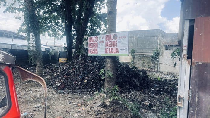 The garbage left at the construction site of the proposed LYR Marketing Corp. at the town center of San Francisco, Agusan del Sur—ironically located in front of the Municipal Health Office. Photo by CHRIS V. PANGANIBAN