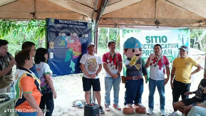 NORDECO mascot waves to the audience during the switch on ceremony of Sitio Electrification Program in Barangay Limbaan, New Corella, Davao del Norte. NORDECO photo