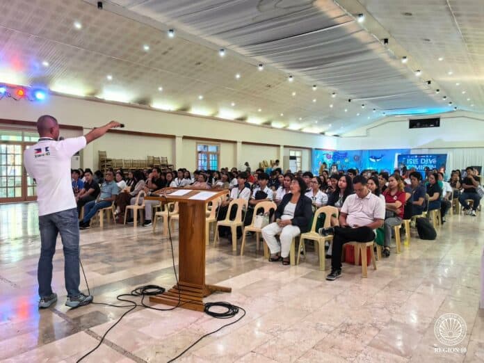 Dive awareness. Tourism leaders, local government officials, fishermen, academe representatives, dive professionals, researchers, and marine advocates gather during the Isle Dive Camiguin 2026: Dive and Reef Awareness Seminar, promoting responsible diving and collective action to protect Camiguin’s marine resources and support sustainable dive tourism on August 12. (Photo courtesy of Dive NorthMin)