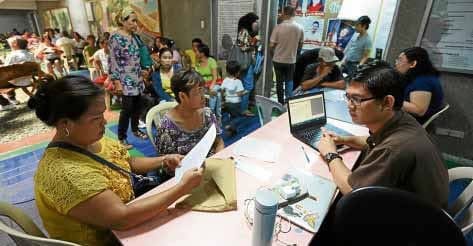 Claimants of the martial law victims’ compensation program process their documents at the Commission on Human Rights Regional Office in Butuan City on May 1, 2019. The distribution was part of the payout awarded to qualified victims and heirs under a landmark class action lawsuit against the estate of former President Ferdinand Marcos Sr. CHRIS V. PANGANIBAN