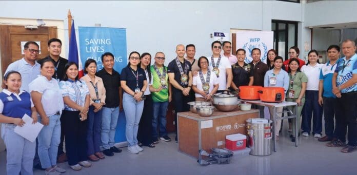 WFP turns over Community Kitchen Kits to Dinagat Islands MLGUs to strengthen disaster preparedness and emergency response. The initiative provides essential cooking equipment to support communities during times of crisis. Photo: Dinagat Islands PDRRMC